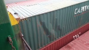 damaged shipping container after shock